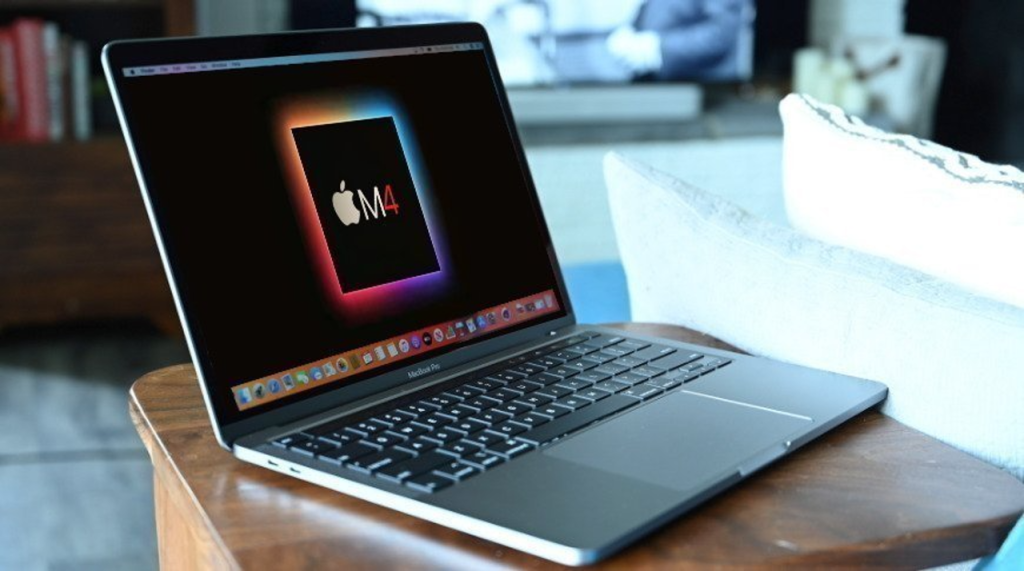 Apple MacBook Pro M4 Max laptop with the M4 processor displayed on the screen