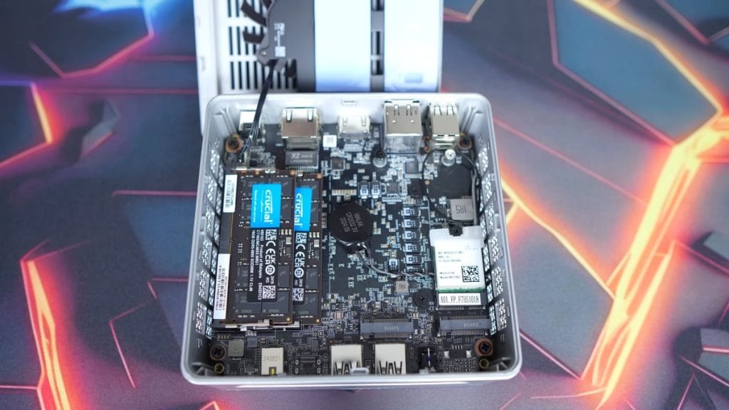 A motherboard with two M.2 SSDs and fans.